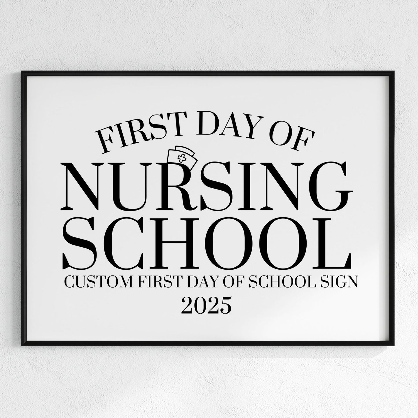 Framed sign with 'First Day of Nursing School' text on a white background