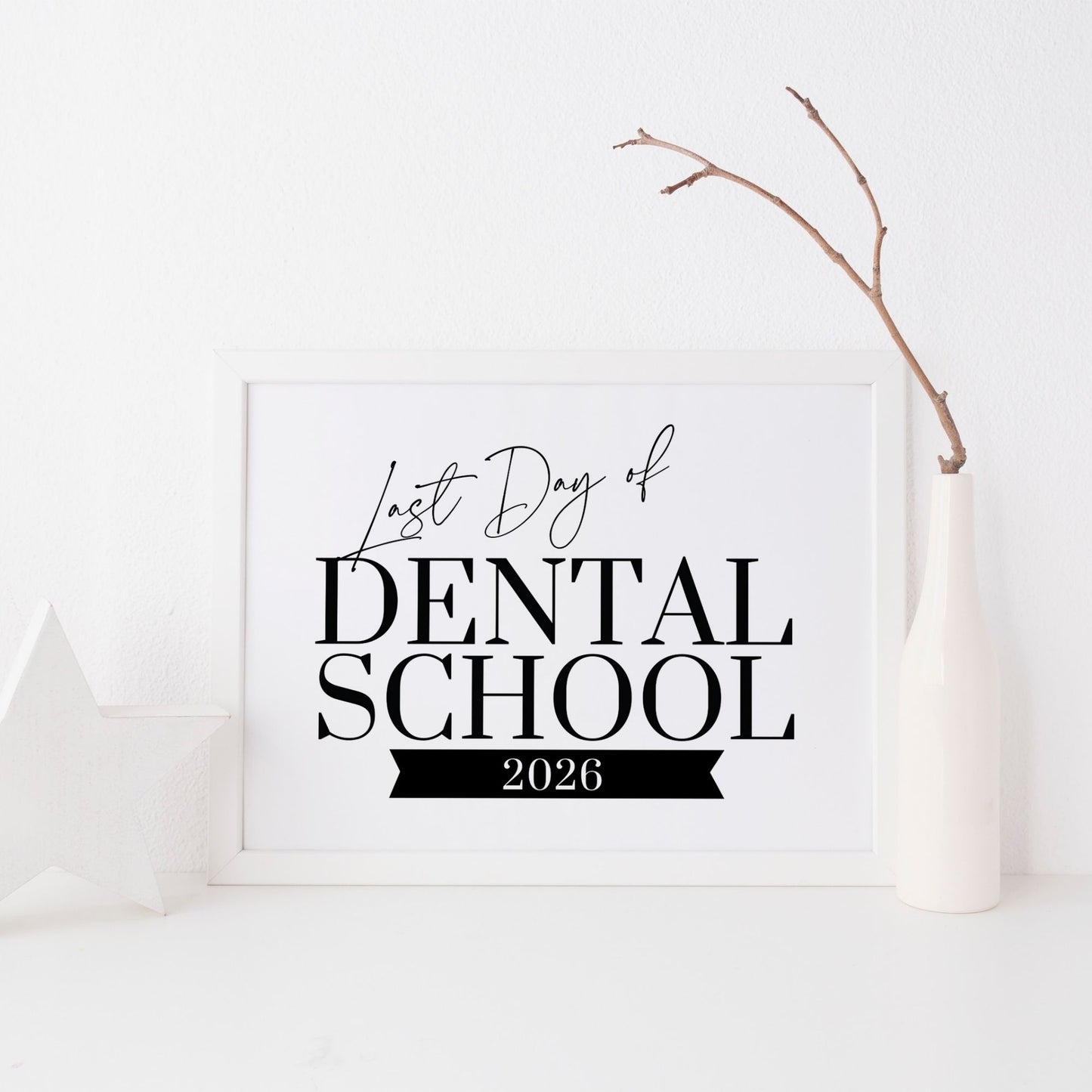 Framed poster with 'Last Day of Dental School 2026' text on a white background