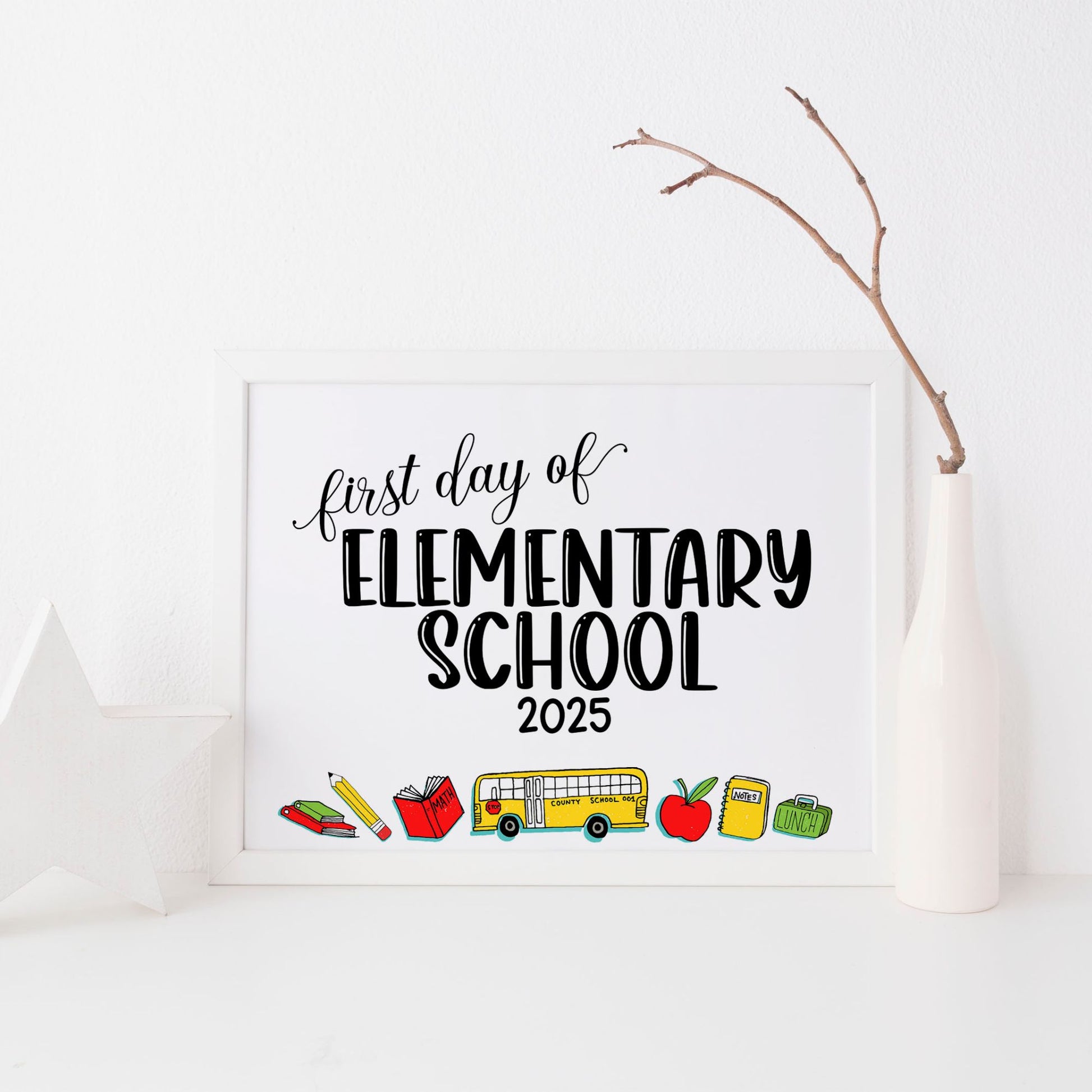 Framed sign with 'first day of Elementary School 2025' text and school-related icons on a white background.