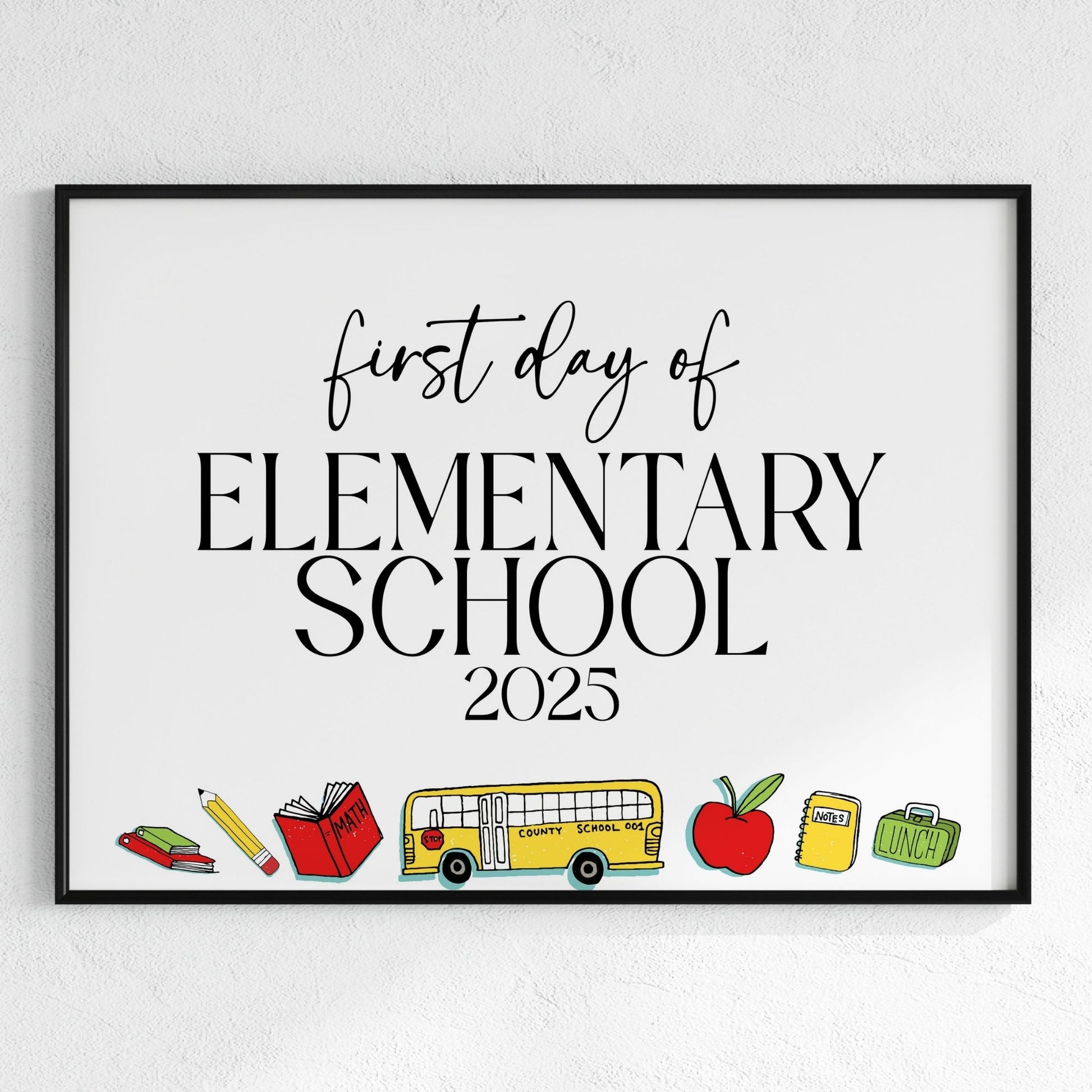 Framed print with 'first day of Elementary School 2025' text and school-related illustrations on a white background.