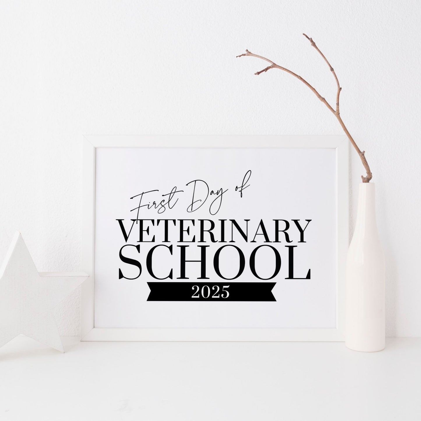 Sign with 'First Day of Veterinary School 2025' text on a white background