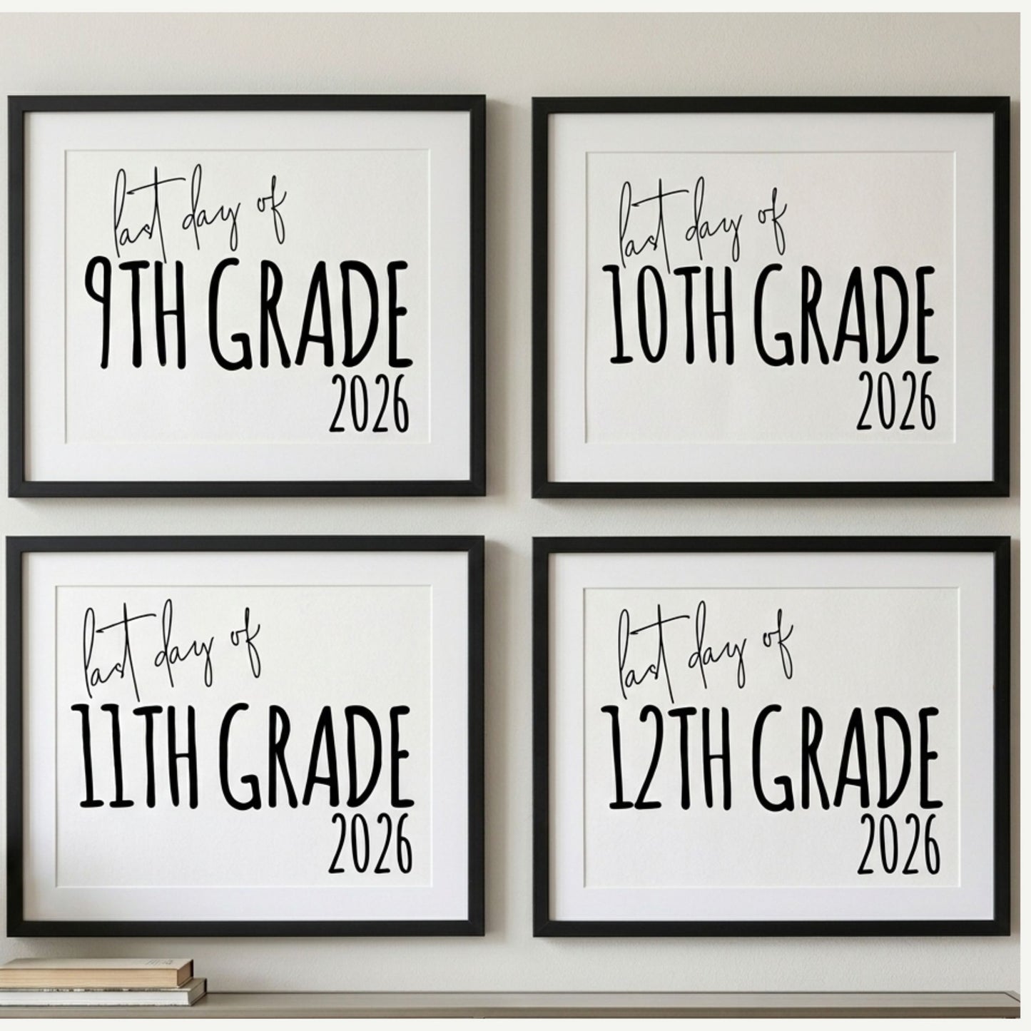 Four framed signs indicating the 'First Day of' for different grades in 2026.