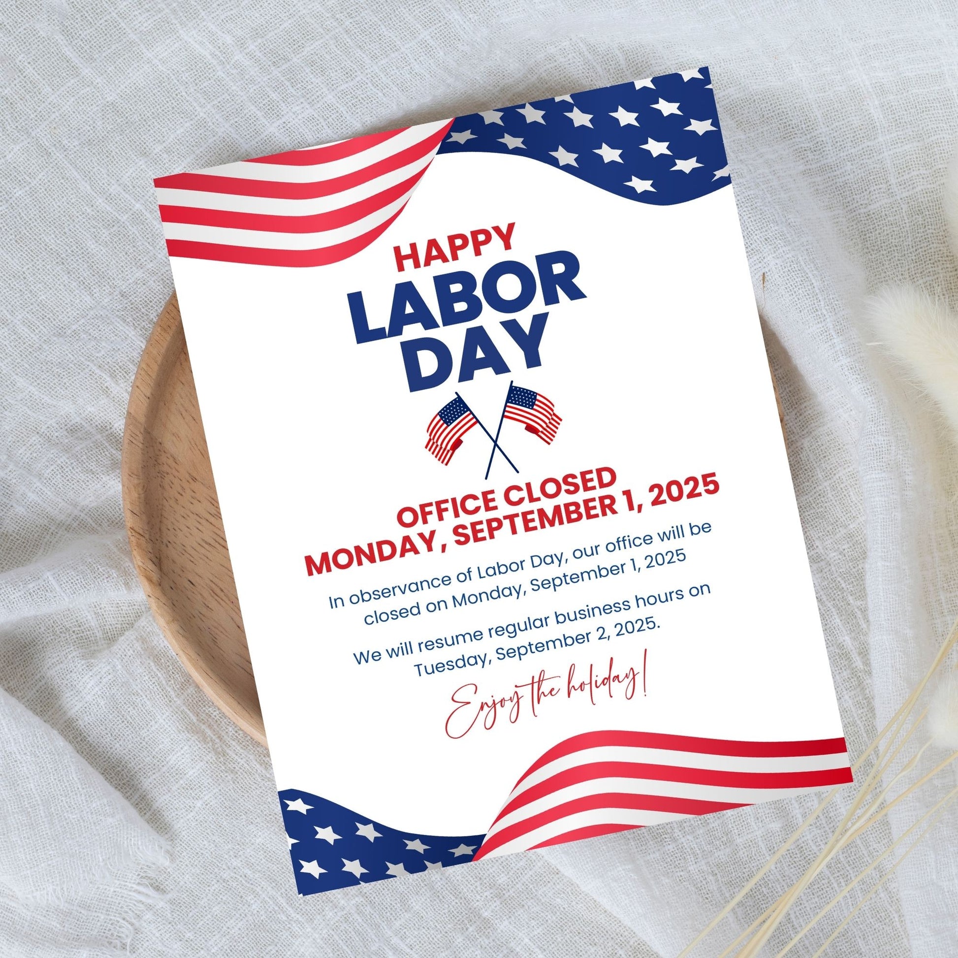 Labor Day office closure notice with American flag design on a textured surface