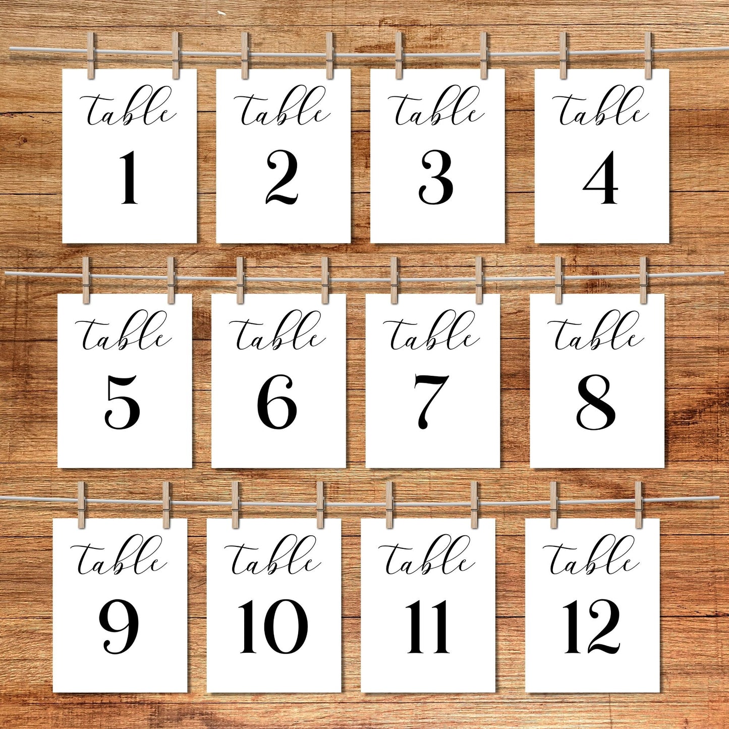 Set of table number cards from 1 to 12 on a wooden background
