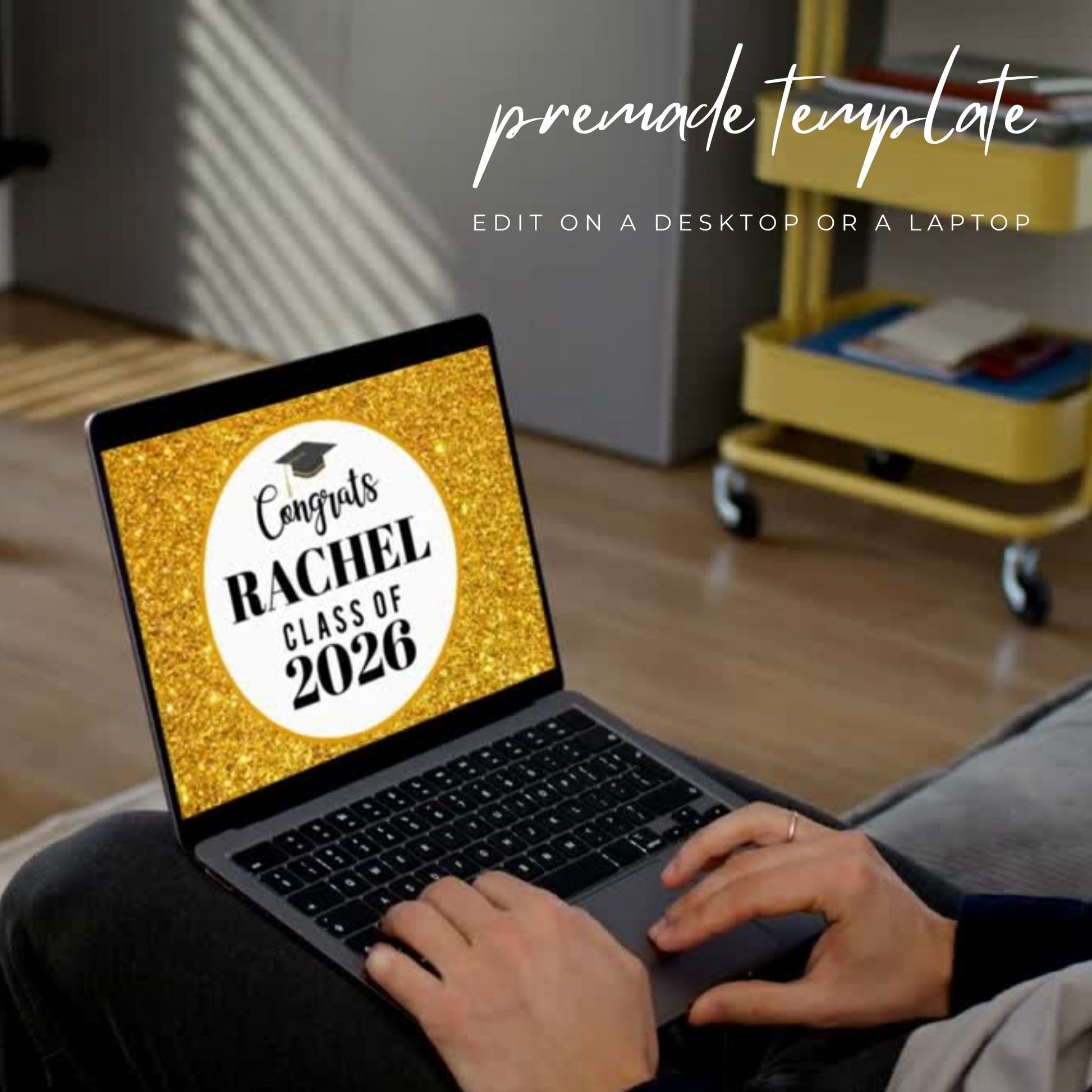 Person using a laptop with a graduation-themed screen in a home setting