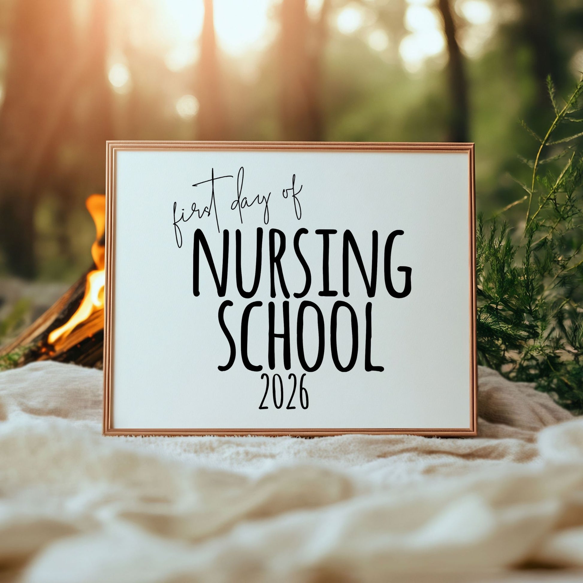 First Day of Nursing School 2026 printable sign in a wood frame on a white blanket. Minimalist medical school photo prop for student social media announcements.