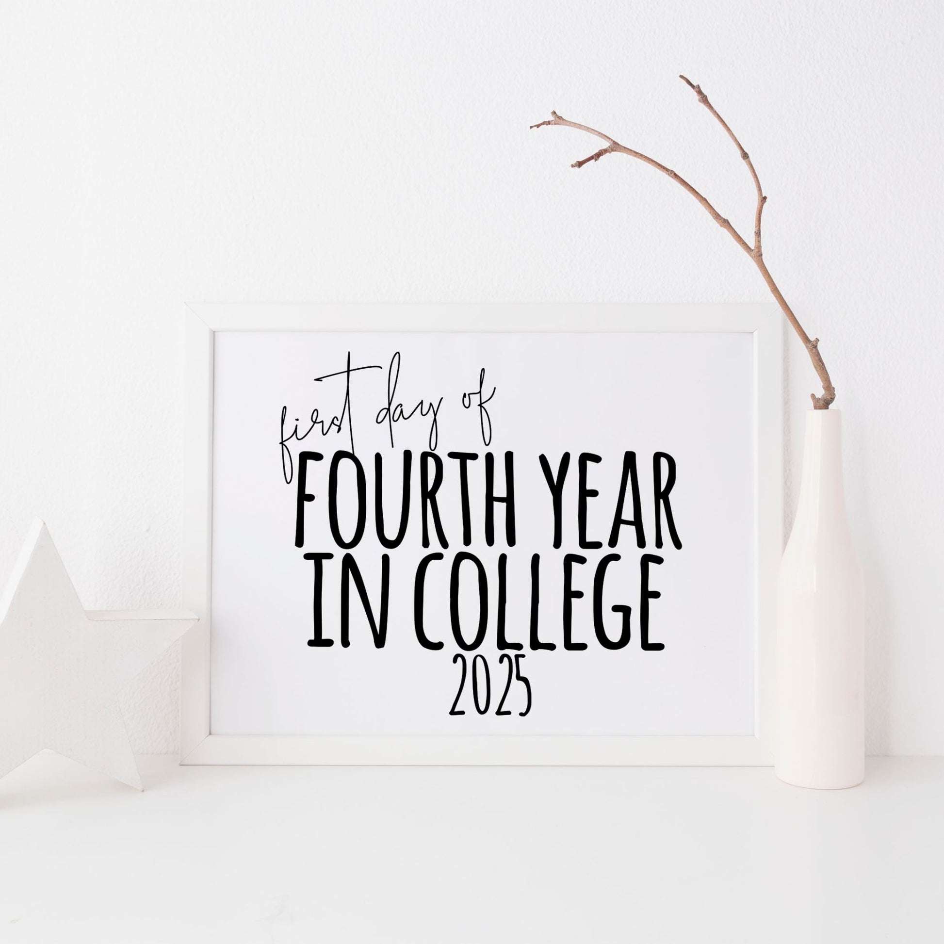Framed sign with 'first day of Fourth Year in College 2023' text on a white background