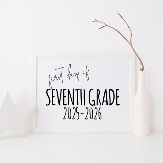 White board with 'first day of Seventh Grade 2025-2026' text on a white background with a branch.