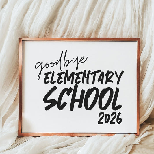 Framed sign with 'goodbye elementary school 2026' text on a soft, white background