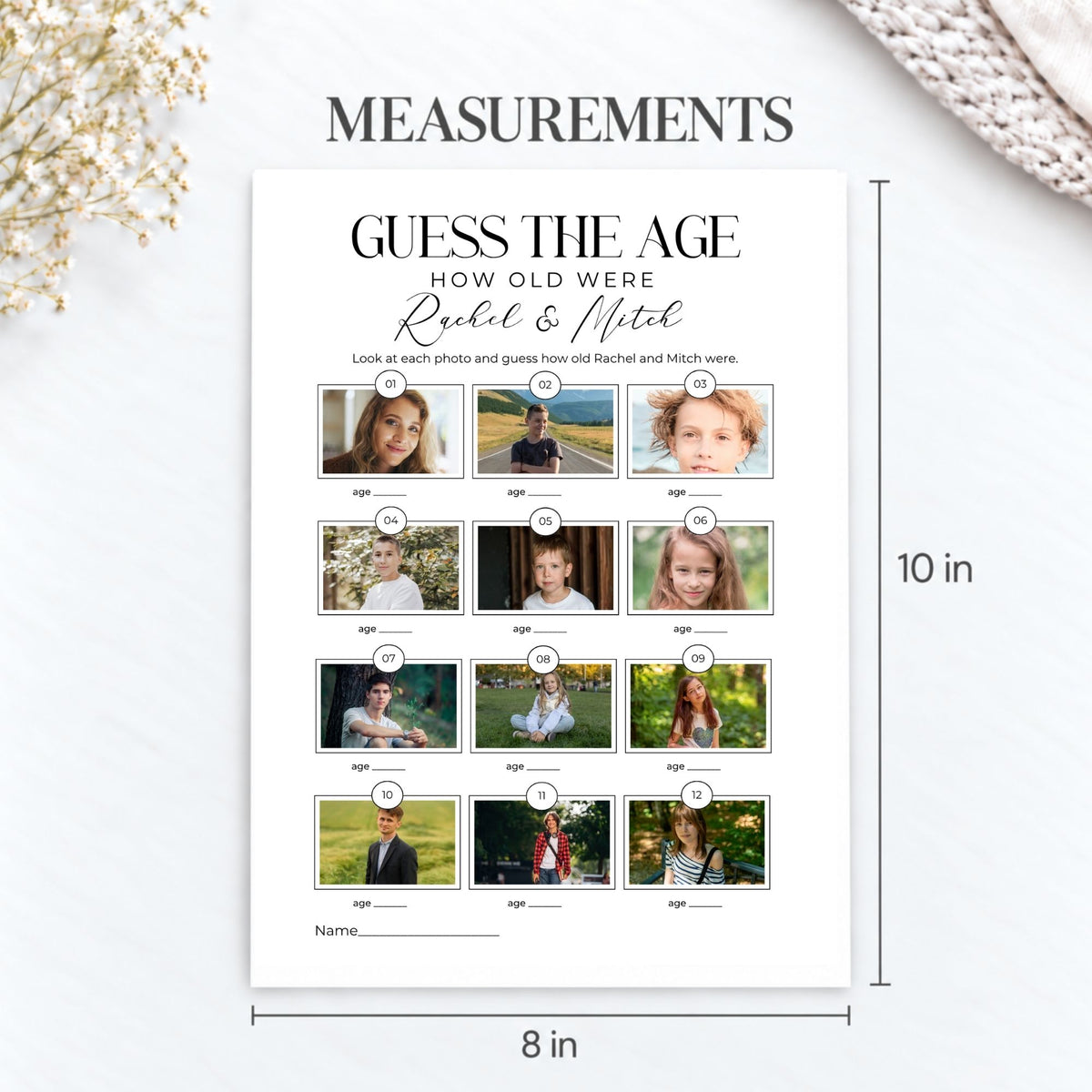 A personalized photo measurement chart for a 'Guess the Age' game, showing a 12-photo grid with dimensions of 8 inches by 10 inches, displayed on a light marble background with decorative dried flowers and a knit blanket.