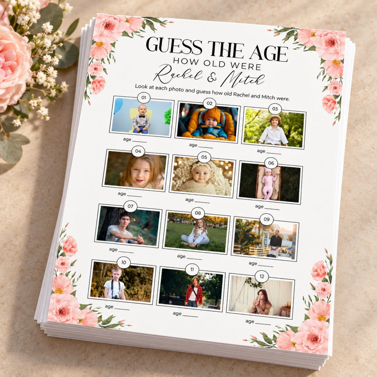 A printed personalized age-guessing card titled 'GUESS THE AGE HOW OLD WERE Rachel & Mitch' with floral pink corner designs and multiple small photo frames with age circles, photographed on a beige surface with flowers beside it.