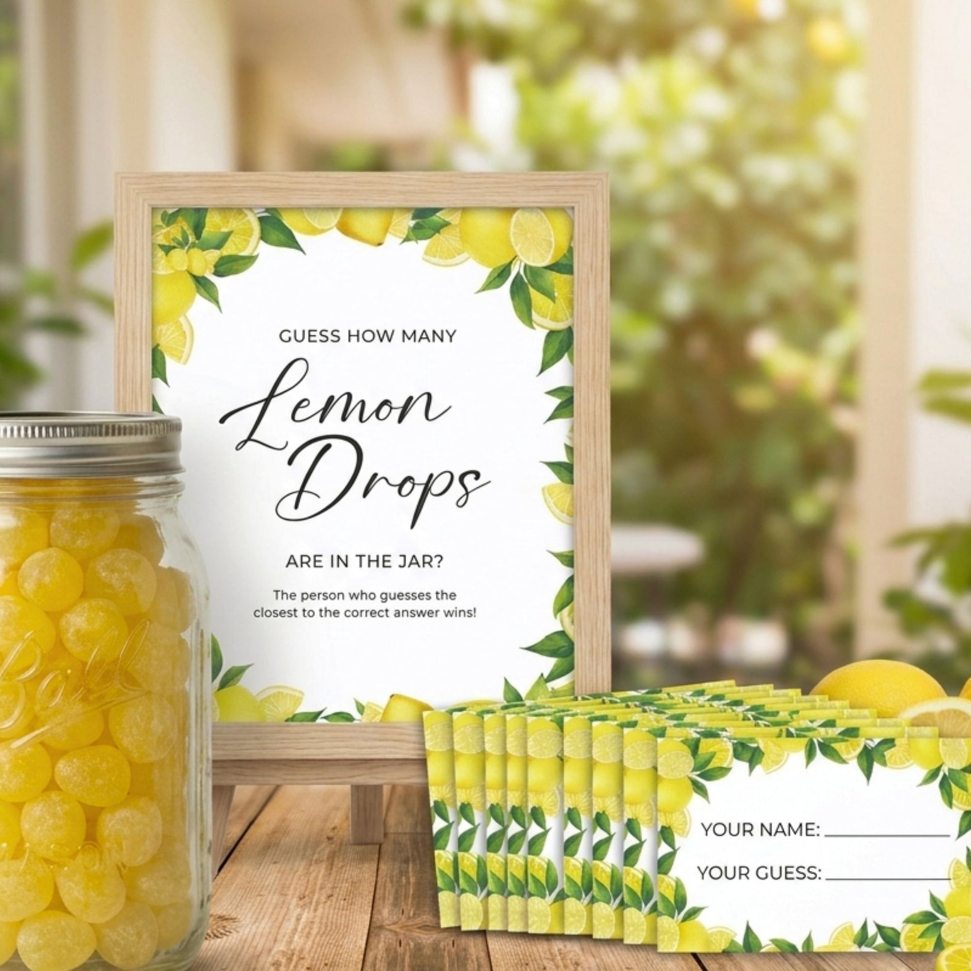 Jar of lemon drops with a 'Guess How Many Lemon Drops' sign and lemon-themed packaging.