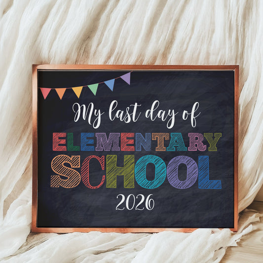 Decorative sign with 'My last day of Elementary School 2026' text on a blackboard background.