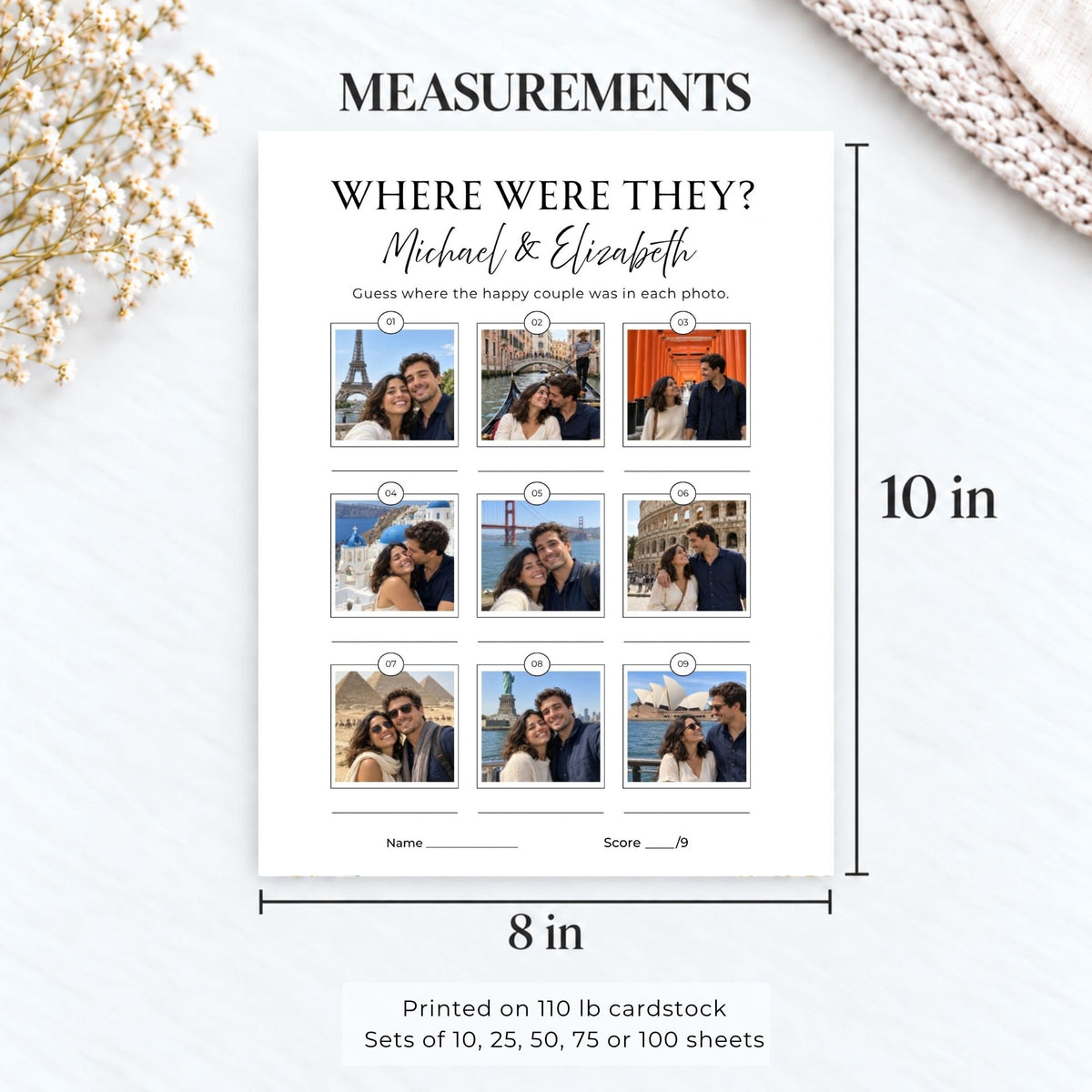 A personalized photo measurement printout for a couple, showing a 3x3 grid of photo placeholders with dimensions labeled 10 in tall by 8 in wide. The cardstock design includes the text 'WHERE WERE THEY? Michael & Elizabeth' and space for names and a score line, shown on a light textured background with decorative dried flowers and a knit fabric corner.